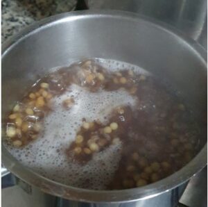 Cook lentils half way through