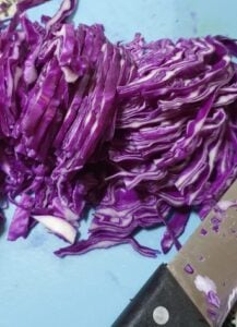 shred chop red cabbage finely