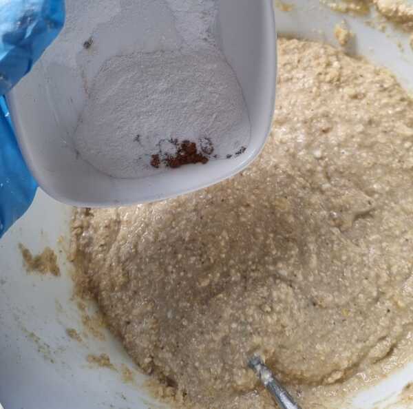 Picture of wet and dry ingredients being combined in a bowl.